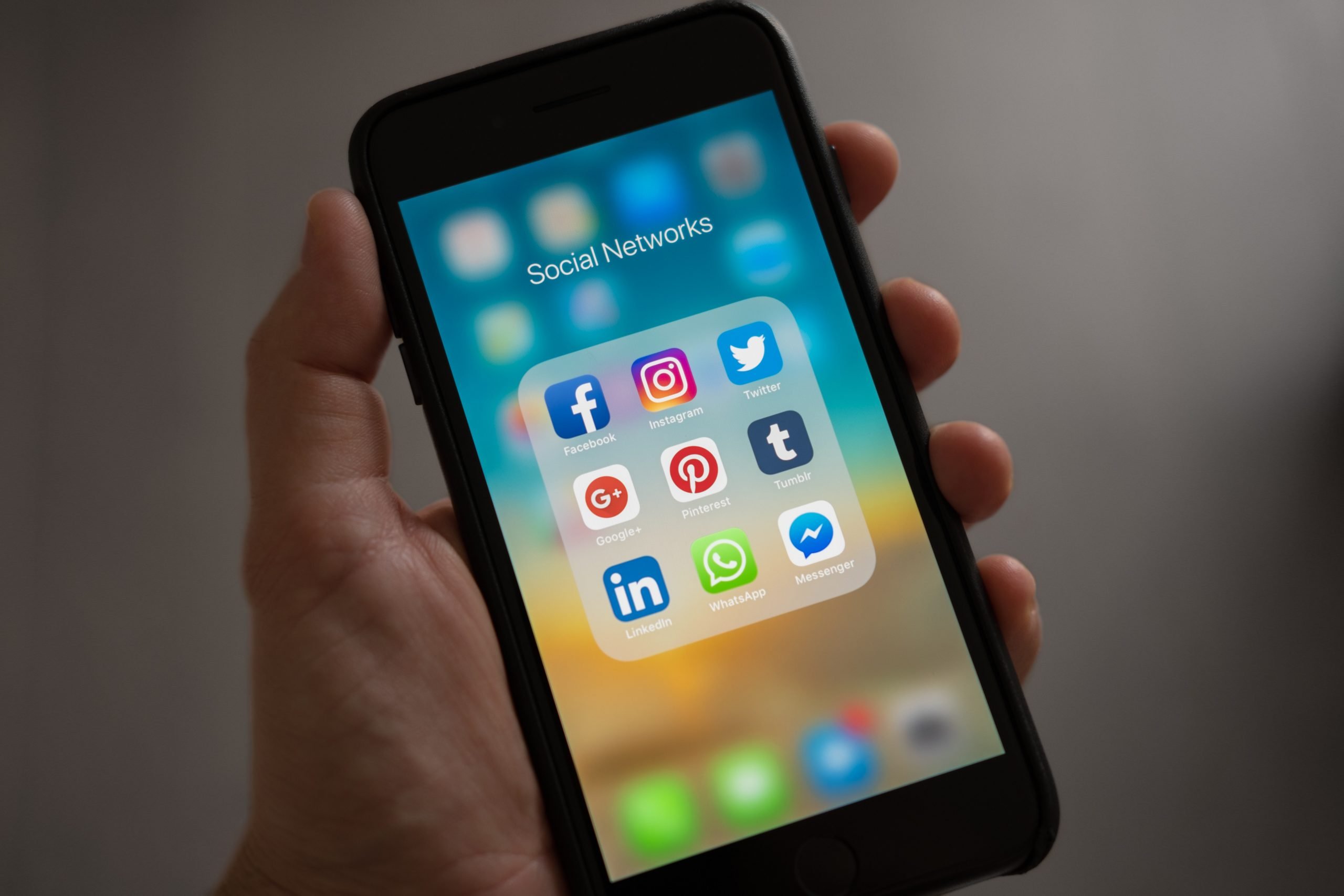 phone with social media icons